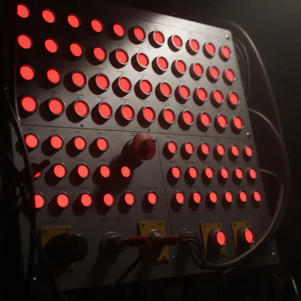Industrial control panel with glowing red buttons